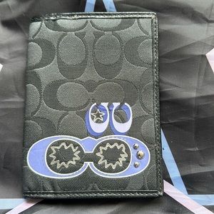 Coach Passport cover
